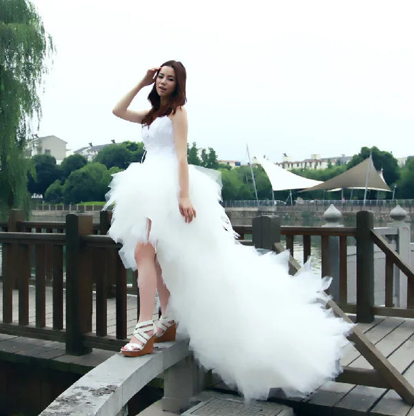 Elegant Princess Wedding Dress with Feather Strapless Design and Lace Up Back